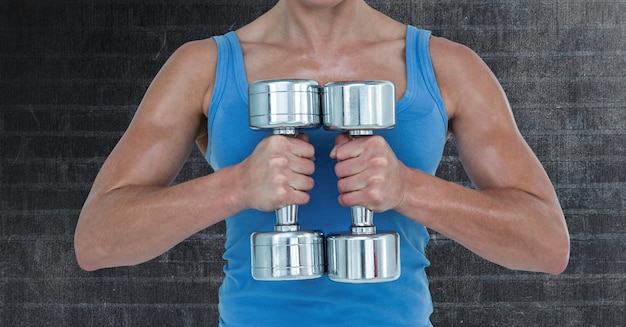 Adjustable dumbbells on a home workout mat