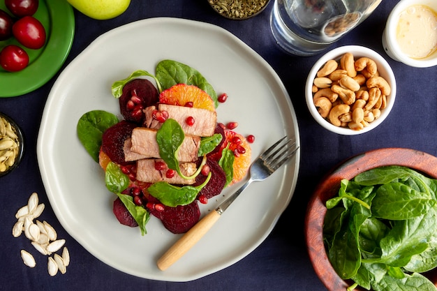 Colorful plate with vegetables, protein, and whole grains