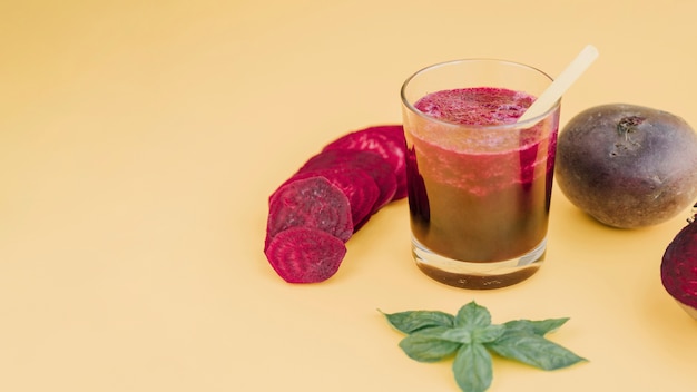 Person drinking beet juice before light exercise