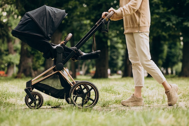 New mom walking briskly with baby in stroller