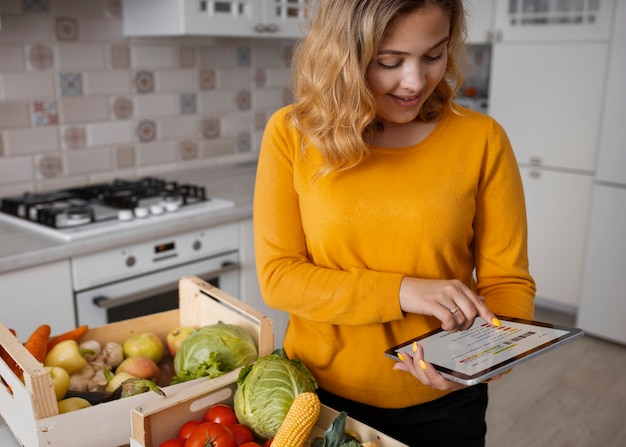 Grocery cart with healthy, affordable foods like beans, vegetables, and whole grains