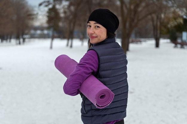 Person stretching outdoors in winter
