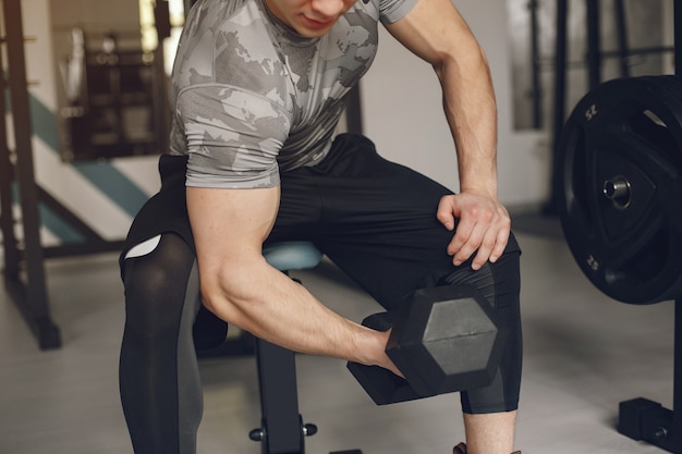 Person doing seated dumbbell press