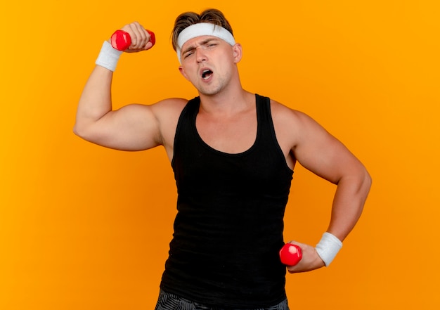 Man measuring body fat and lifting weights