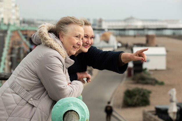 Elderly Finns enjoying outdoor activity in a snowy forest