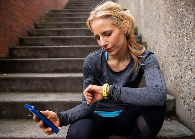 Student using a fitness tracker on a laptop