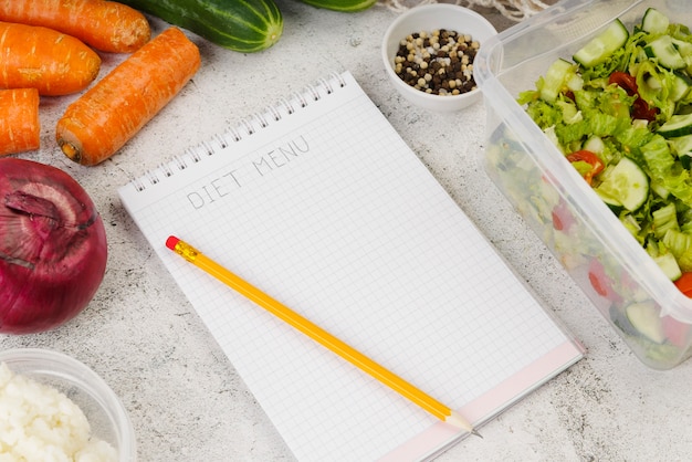 Senior writing in a nutrition journal