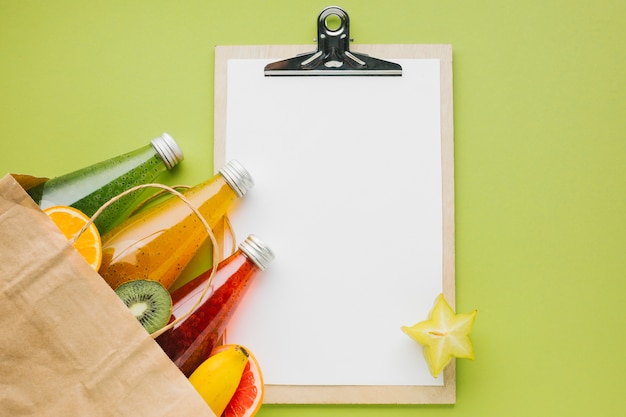 Organized grocery shopping with reusable bags and a checklist