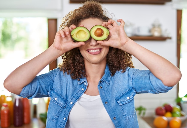 Avocado slices on a plate with heart symbol