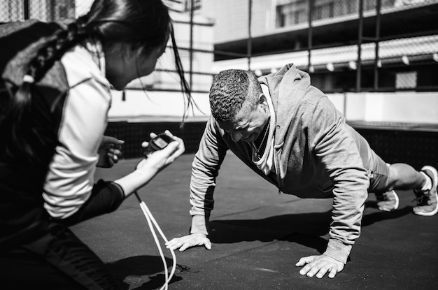 Person doing HIIT workout on a stationary bike