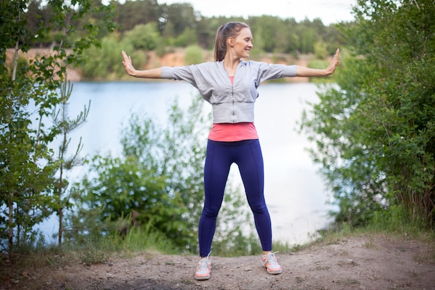 Woman practicing yoga for hormone health