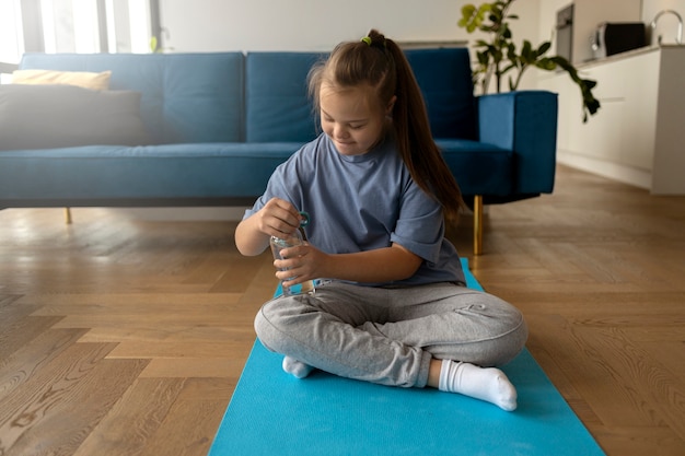 Family doing exercises together in living room
