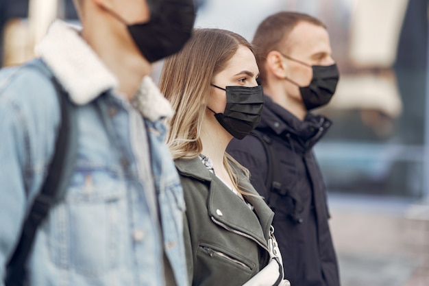 People wearing masks in public spaces