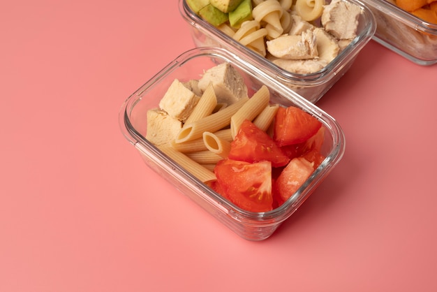 Glass meal prep containers with colorful, balanced meals