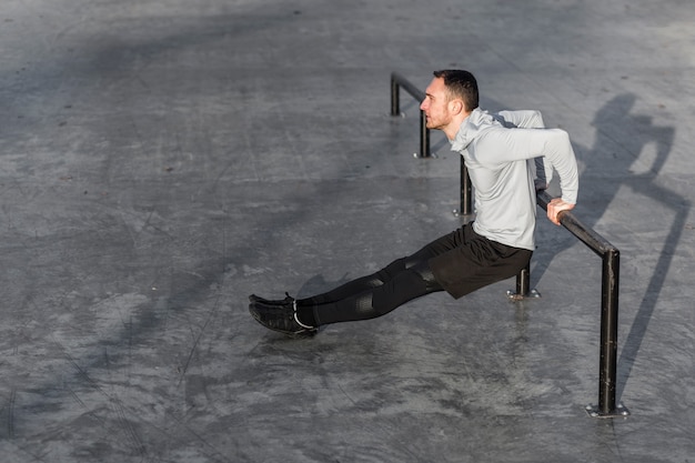 Office worker standing and stretching at desk