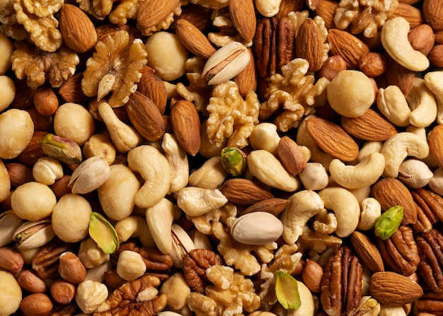 Assorted nuts and seeds in a wooden bowl
