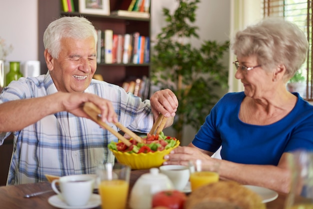 An older adult enjoying a balanced meal at home