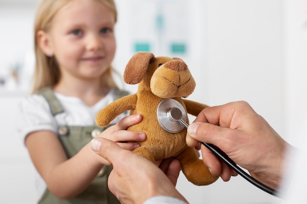Doctor using ultrasound device on a child