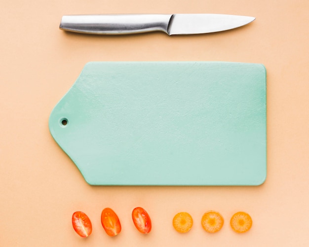 Plastic cutting board with knife