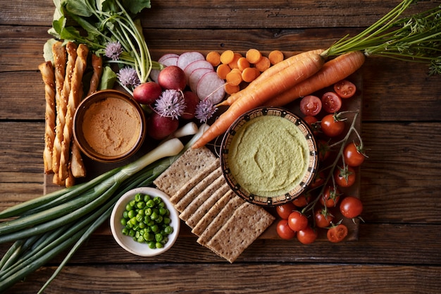Packaged vegan meats and cheeses on a supermarket shelf