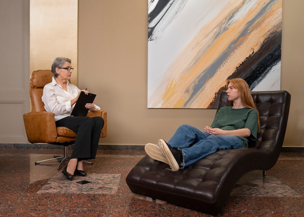 Therapist guiding a patient through a psychedelic therapy session