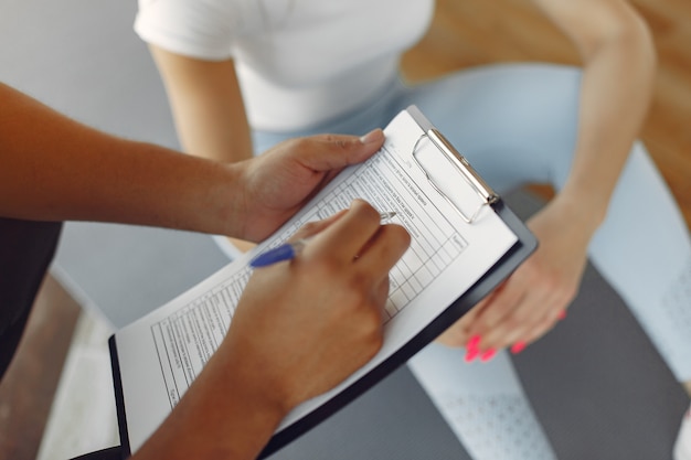 Traveler using a tablet to track rehab exercises