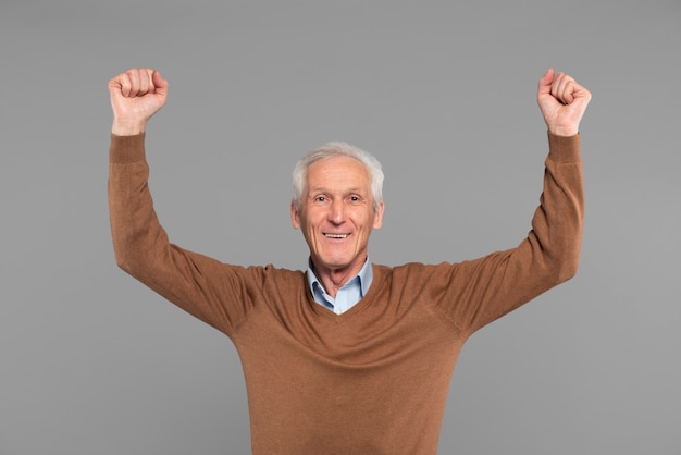 Senior couple using fitness tracker and journal