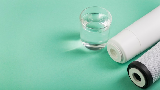 Minimalist hydration setup with water bottle and checklist