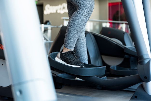 Person using stair climber at gym