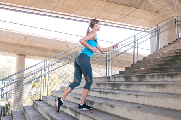 Athlete doing stair workout in a building
