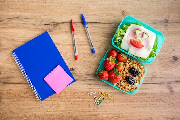 A college student preparing meals in a dorm kitchen