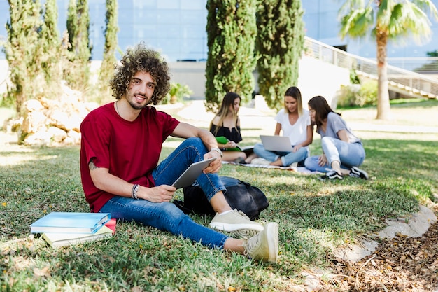 Student walking in a park during daylight