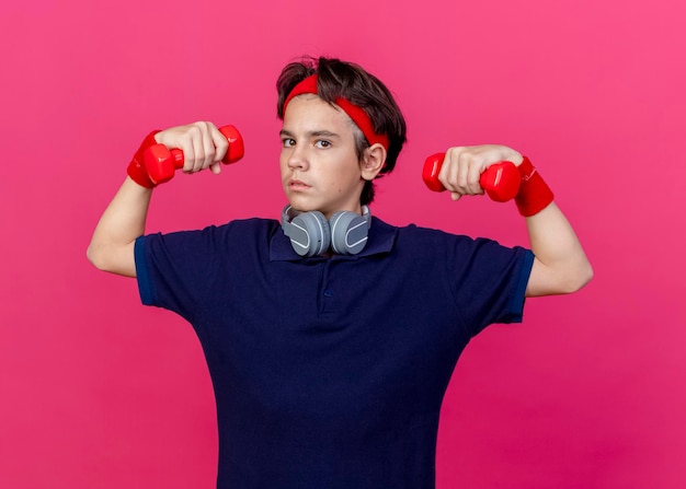 Teenager performing weight training at the gym