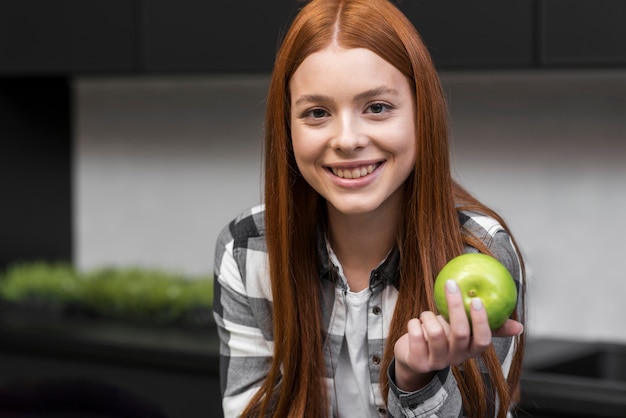 Teen eating a balanced meal with vegetables and protein