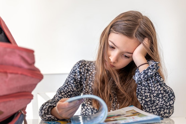 High school student studying with notes on memory
