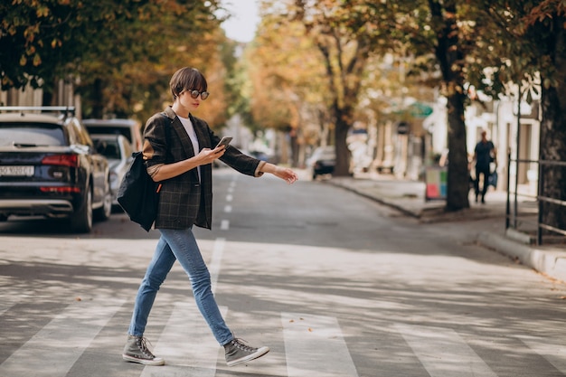 Traveler walking through a vibrant city street