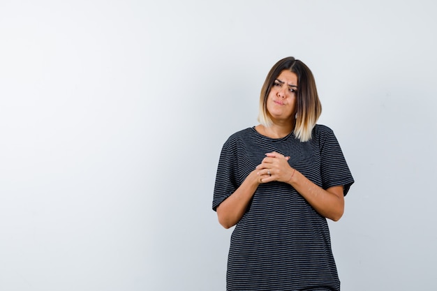 Woman experiencing chest pain