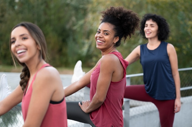 Middle-aged women doing resistance exercises in a fitness class