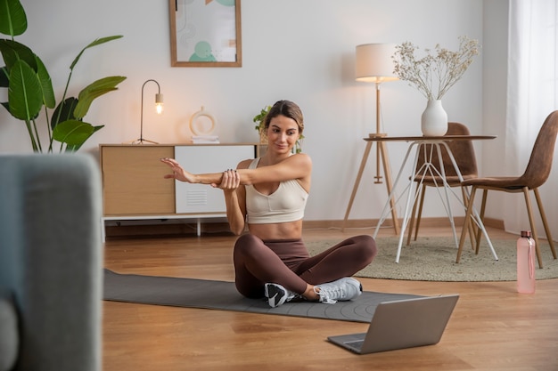 Person doing yoga in living room