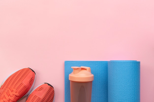 Yoga mat next to a nutritious grain bowl