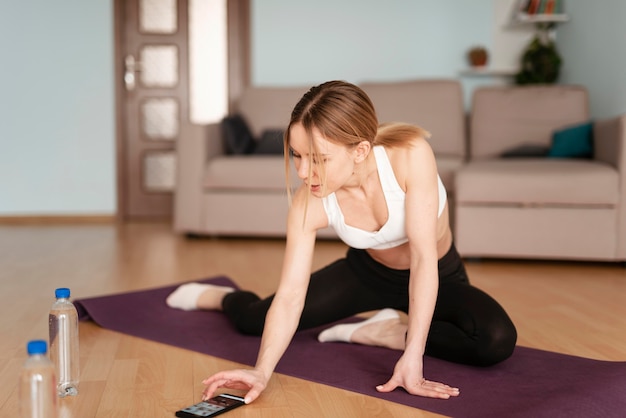 Person doing a simple yoga pose in a hotel room
